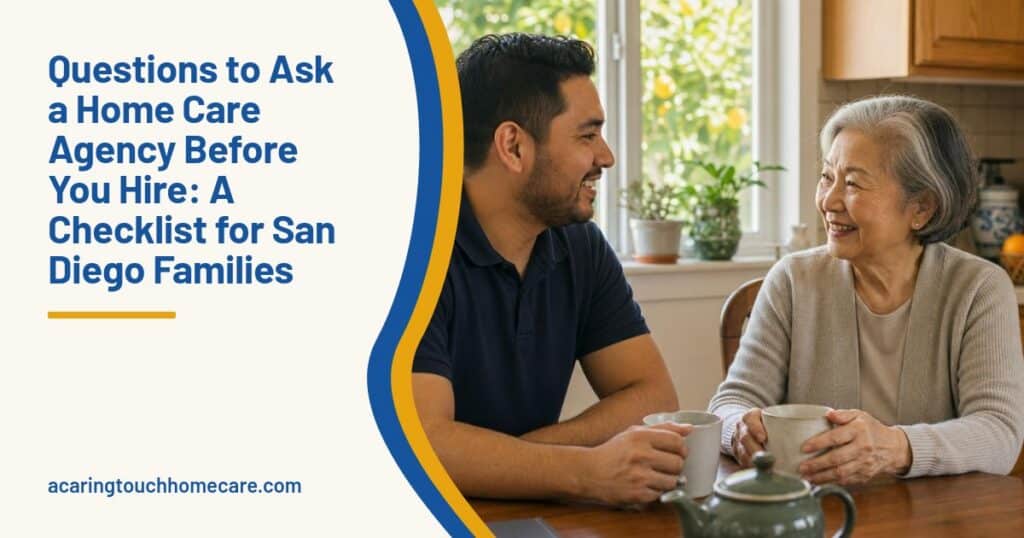 A caregiver and an older woman chat over tea at a sunny kitchen table in a San Diego home.